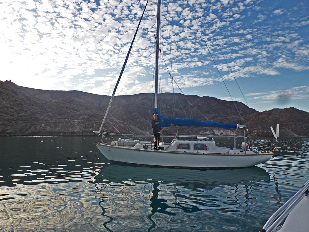 Mary on boat, side view