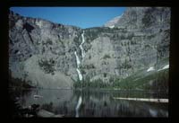 Waterfall and lake in Glacier National Park