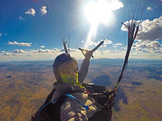 Leighton says, 'flying in Manilla on one of my 100k days.' 
Image 2
