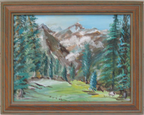 Mountain peak viewd through trees