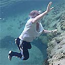 Williford Spring swimmer with rocks from the vent, 2018-08-29