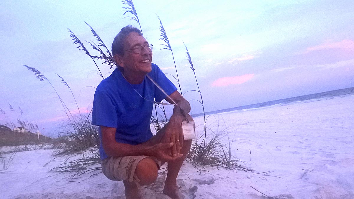 Bobby Stuart, a verteran turtle watcher on the beach in south Walton county