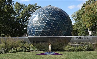 Yoga mat or rug design to give a sense of completion to being within the earth. View is outdside with cutaway view of the dome.