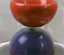 Wholeo symbol in bowl-shaped magnetic field emitters